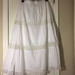 White 3 tier skirt. Lace accented on each tier.